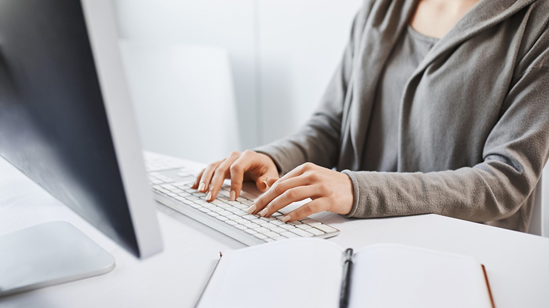 Working hard to party hard on weekends. Cropped shot of woman typing on keyboard